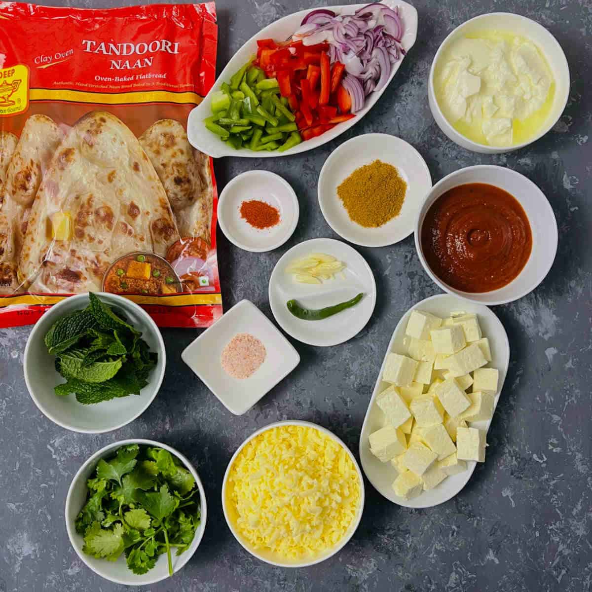 ingredients to make tandoori paneer naan pizza