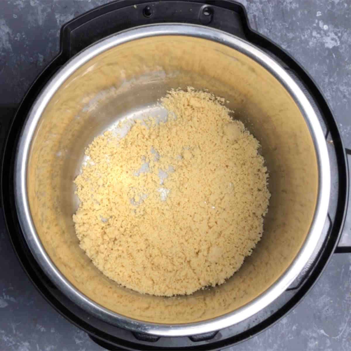 Add almond flour to Instant Pot and saute 2 minutes with little ghee.