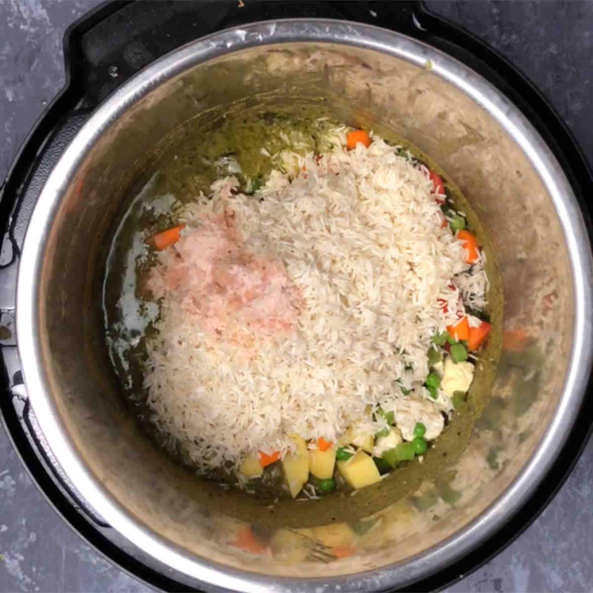 Add vegs, rice, and salt.