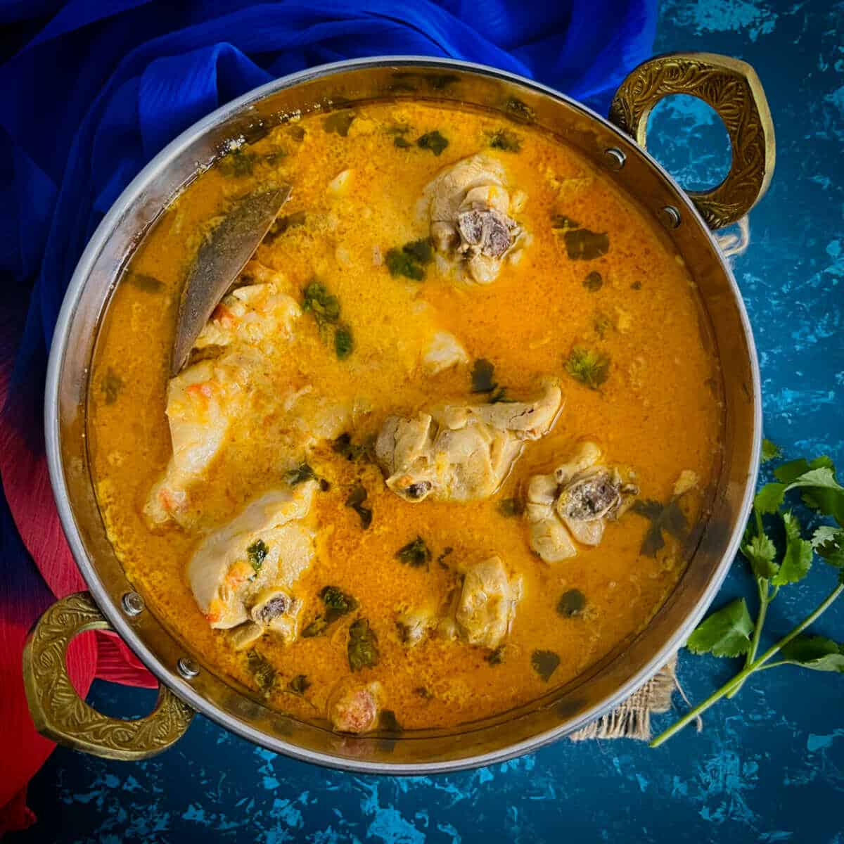 Balti chicken placed in a traditional balti bowl.