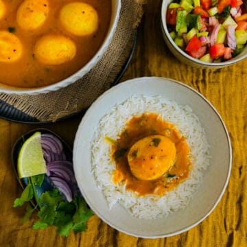 egg curry served with rice.