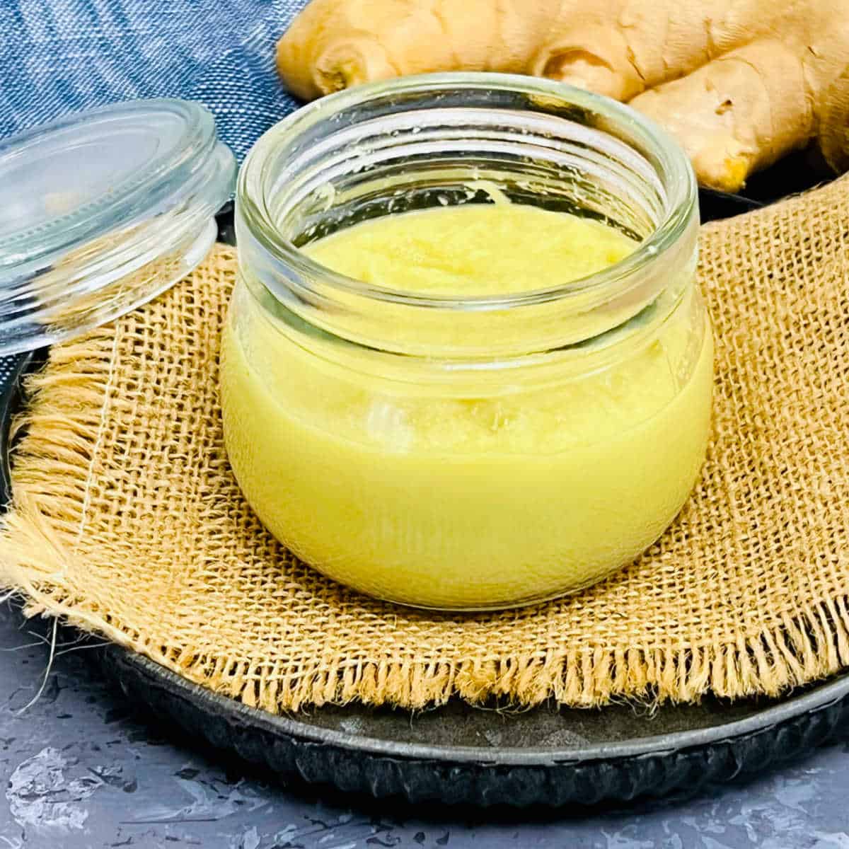 Ginger paste stored in a glass jar.