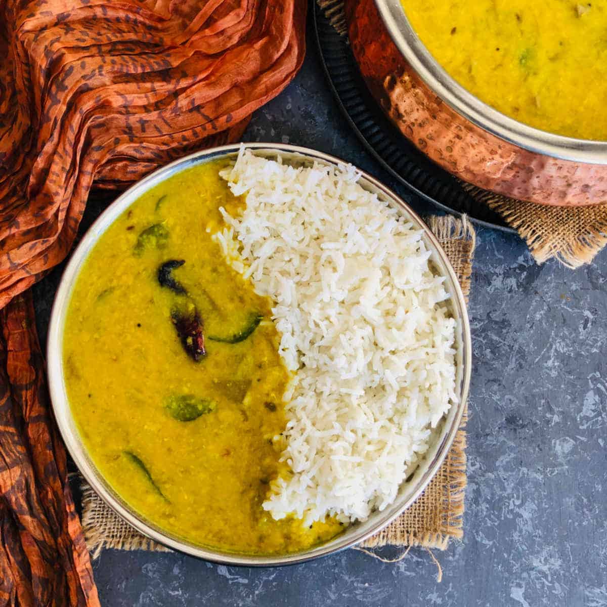 mango dal served with rice.