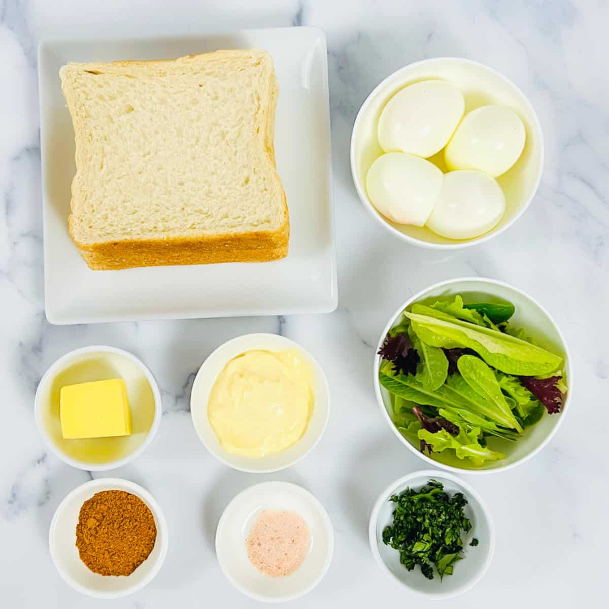 Ingredients to make curried egg mayo sandwich.