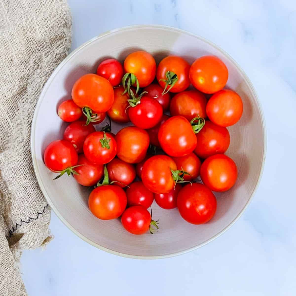 Fresh tomatoes in a bowl.