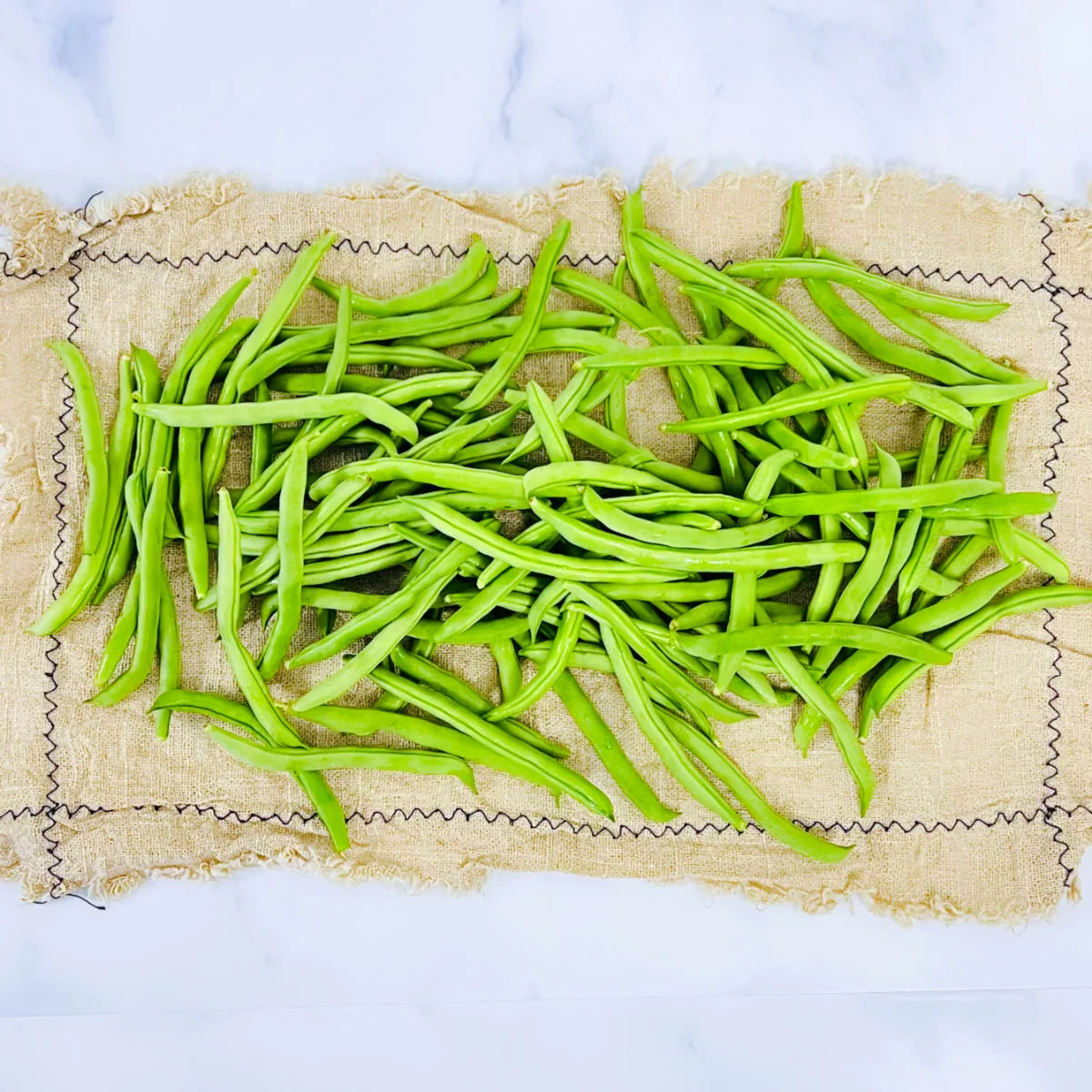Wash and dry the green beans.