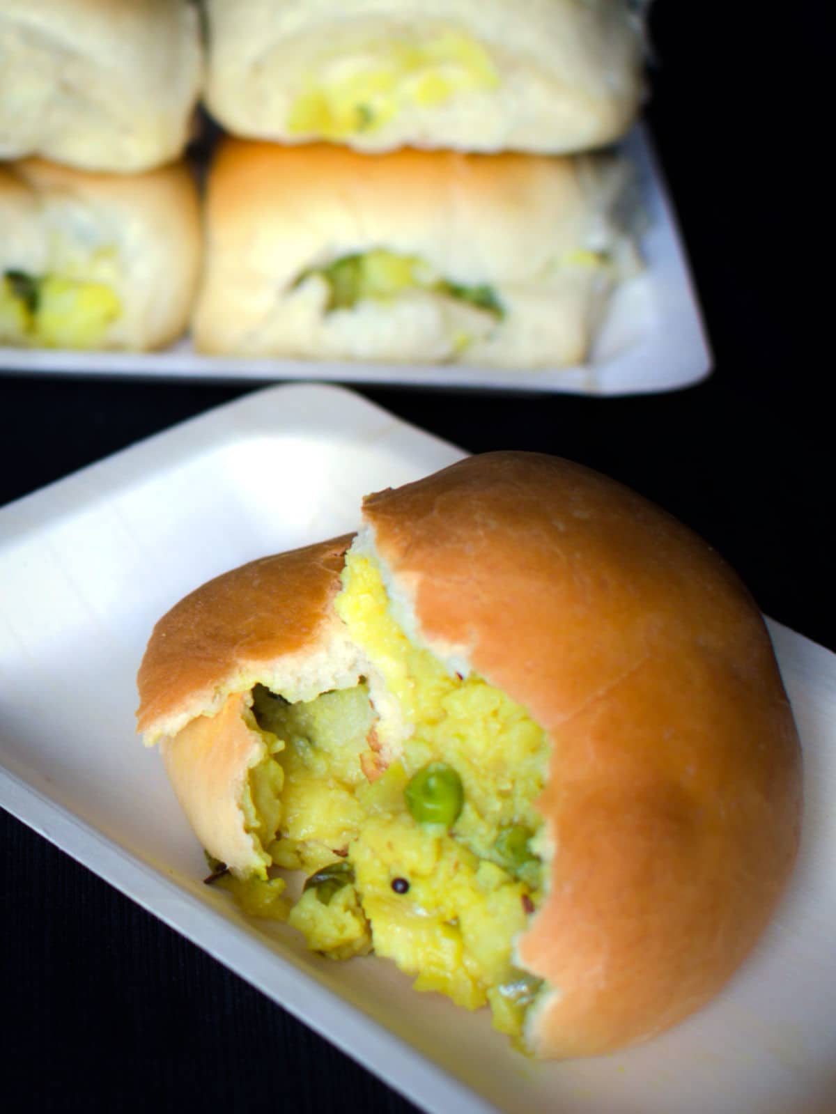 Close up of palya bun showing the inner filling.