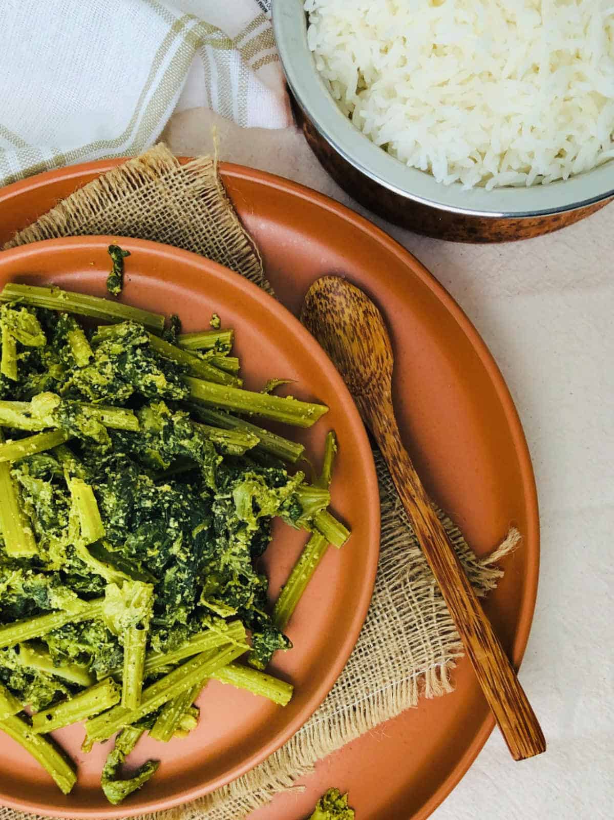 Bottle gourd leaves sabzi served with steamed rice.