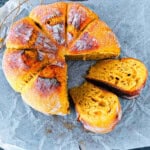 Pumpkin sourdough bread placed on a parchment paper.