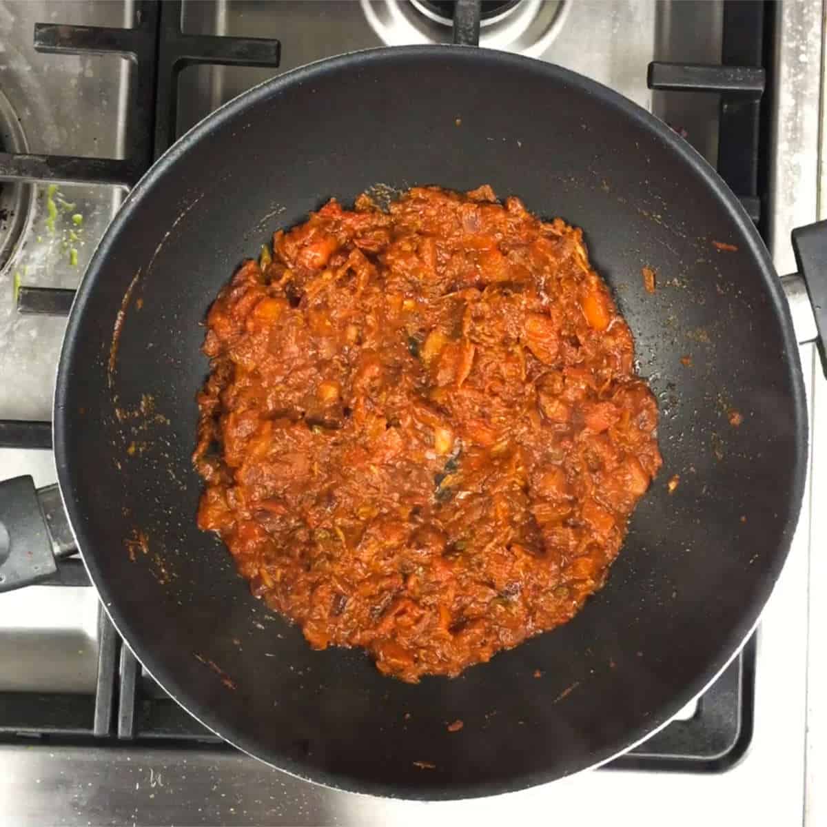 Cook the tomatoes and spices well.