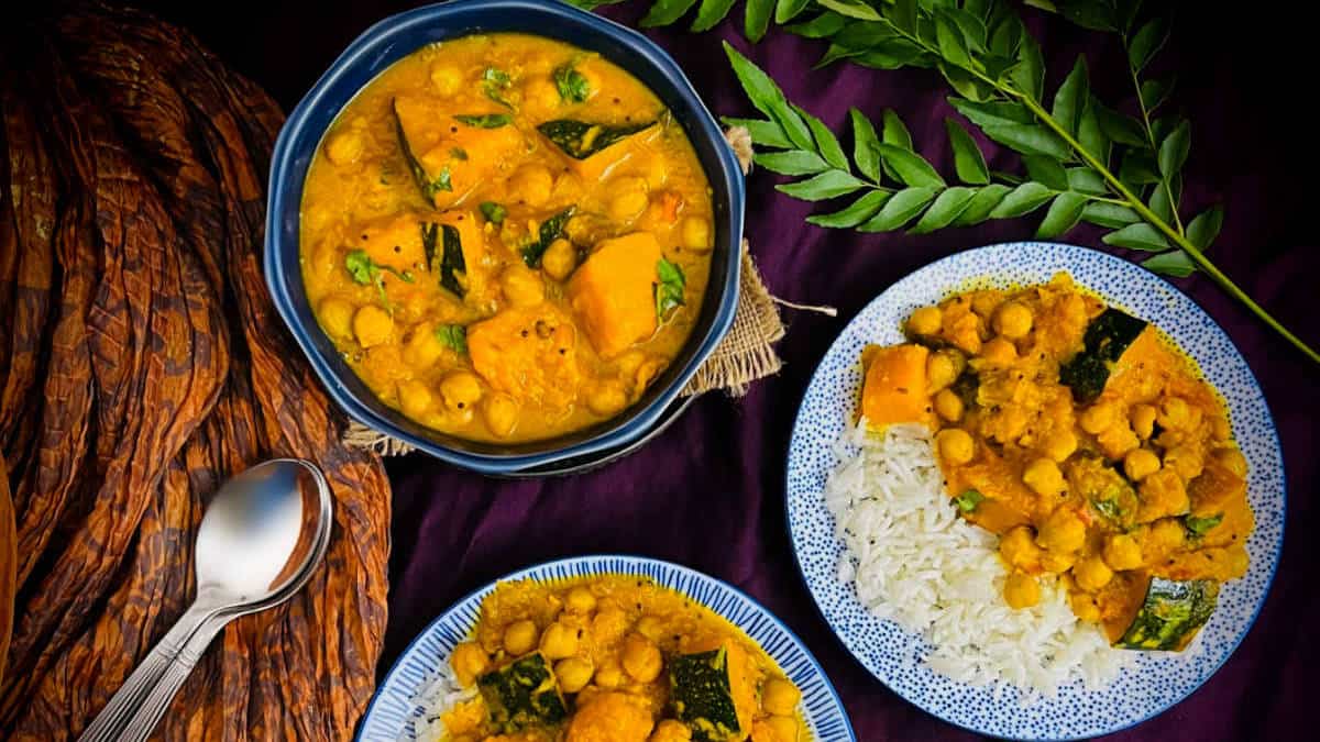 Pumpkin chickpea curry served with rice.
