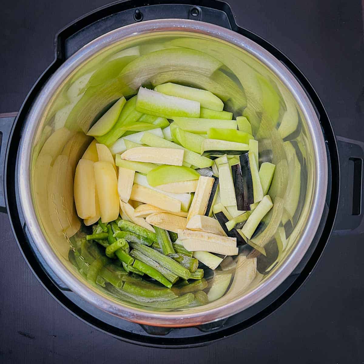 Vegetables in the inner pot of Instant pot.