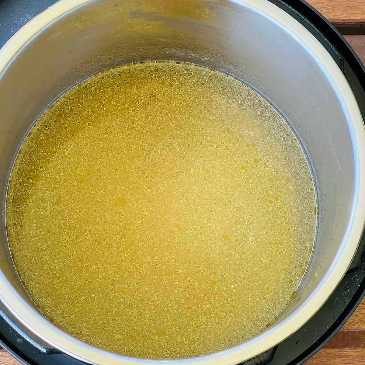 Strain the broth to remove whole spices and other ingredients.