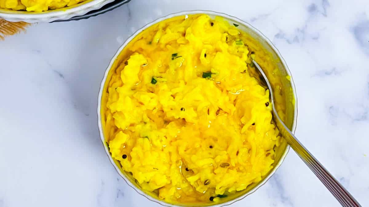 A bowl of kitchari topped with ghee.