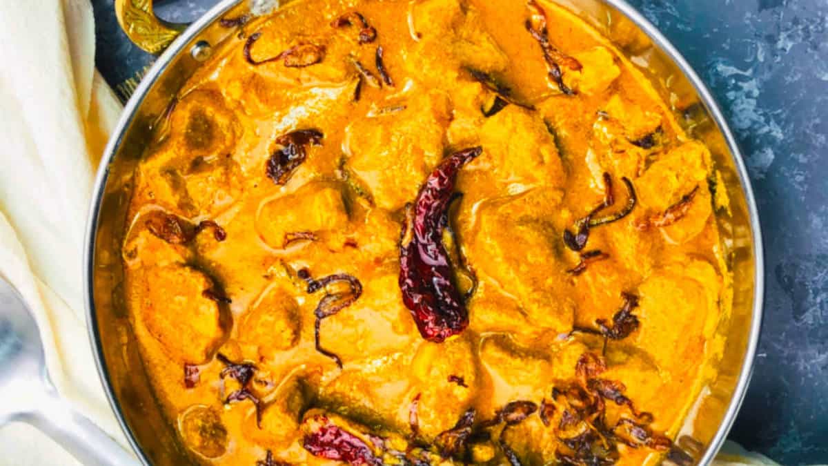 Kolhapuri chicken curry in a kadhai.