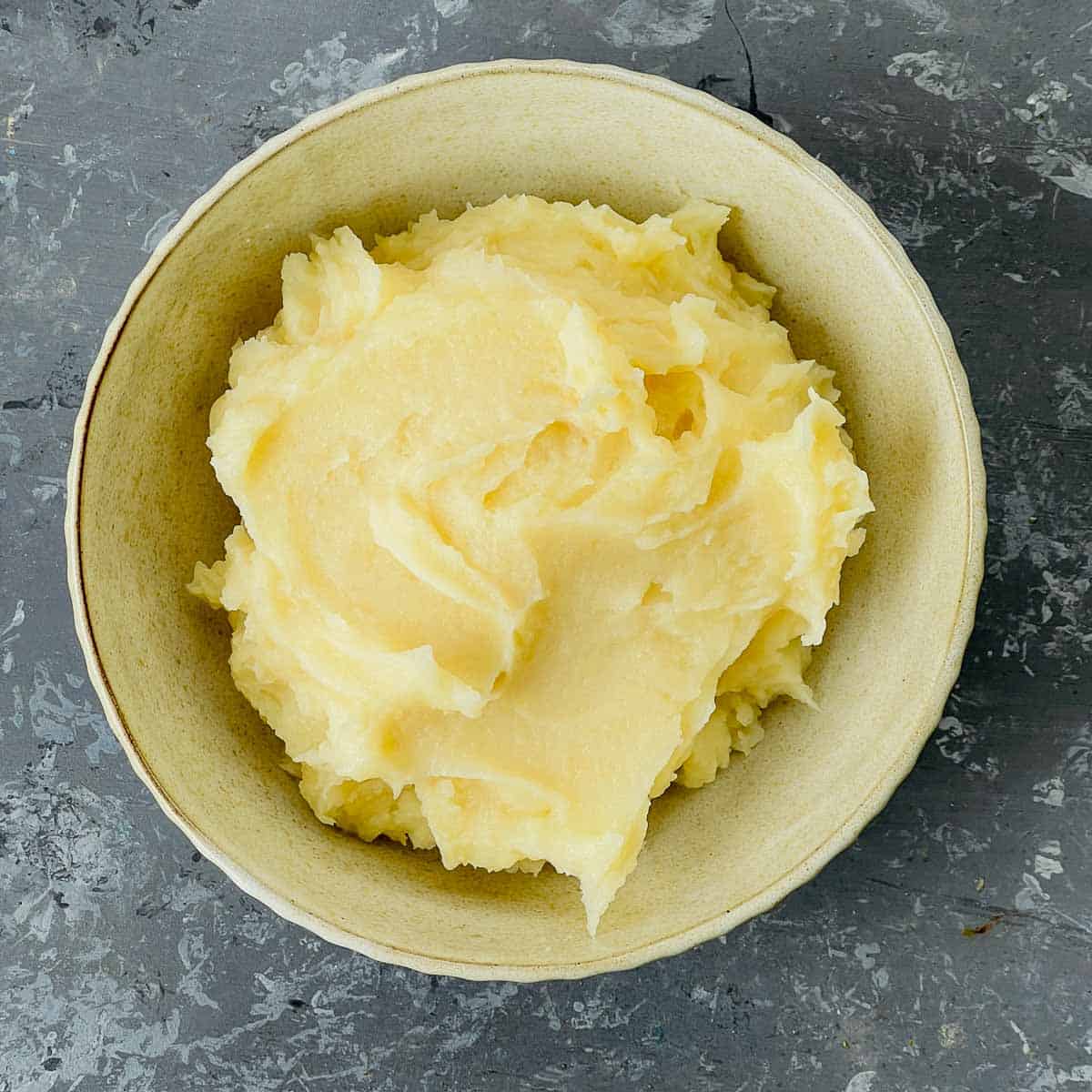 Boil and mash the potatoes.