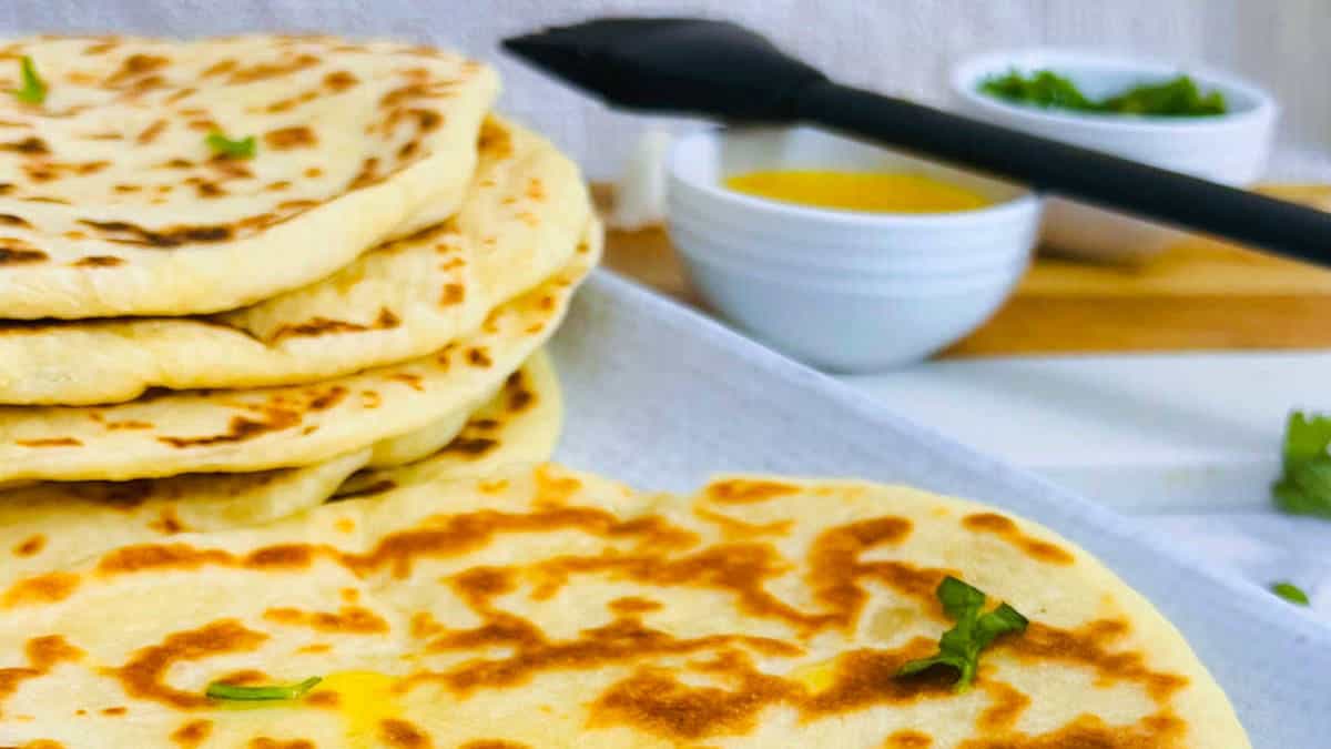 Naan bread stacked over each other.