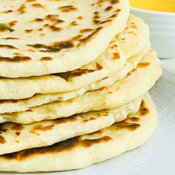 A stack of homemade naan.