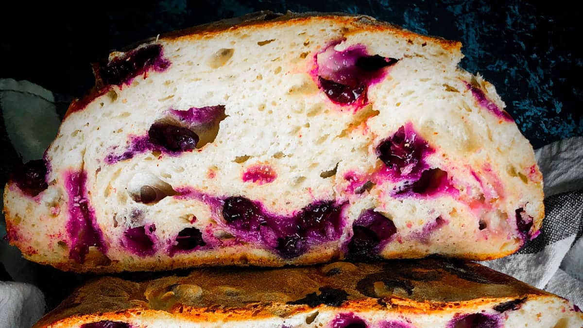 Sourdough blueberry bread on a plate.