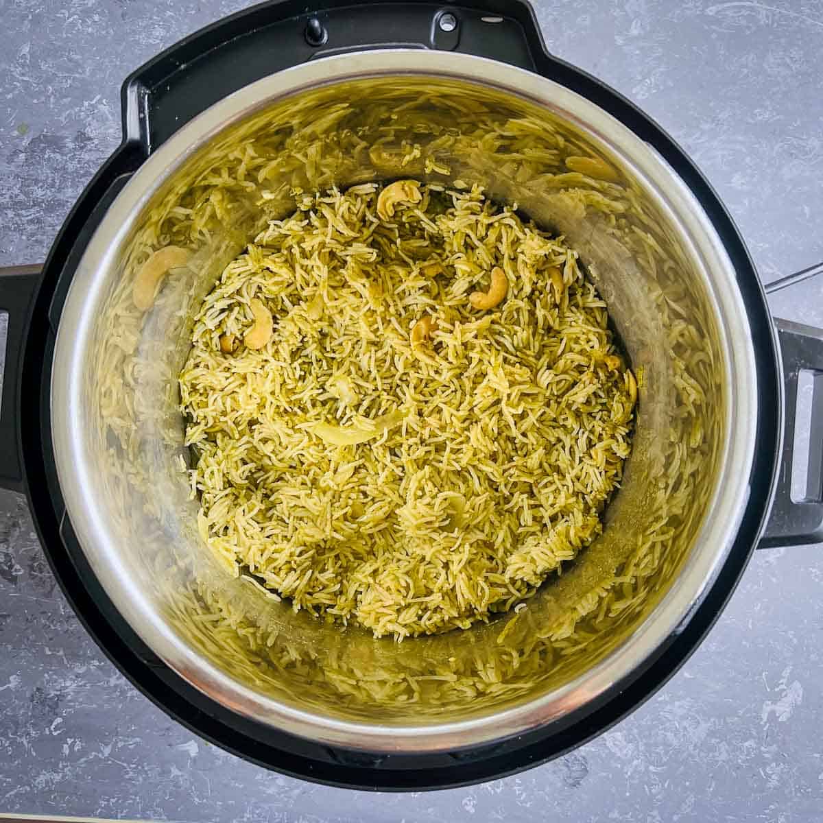 Step showing cilantro rice after pressure cooking in the Instant Pot.