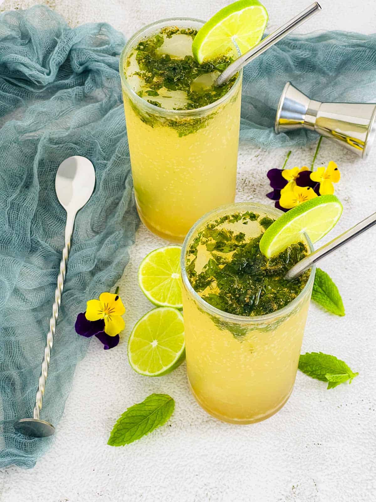 Masala mojito topped with mint leaves.