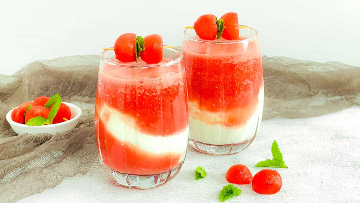 Two glasses of watermelon lassi cocktail.