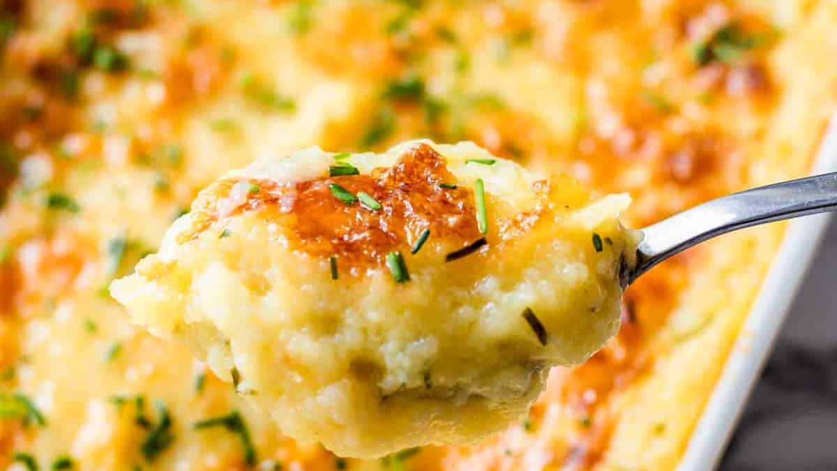 A spoonful of cheesy mashed potatoes.