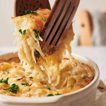 Hashbrown casserole being served.