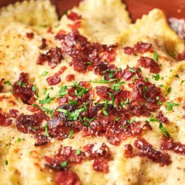A dish of ravioli with bacon and parsley that can be found at Olive Garden.