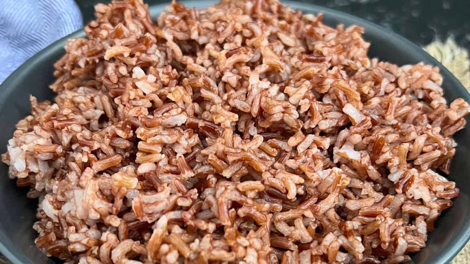 A bowl of Red Rice displayed close-up.
