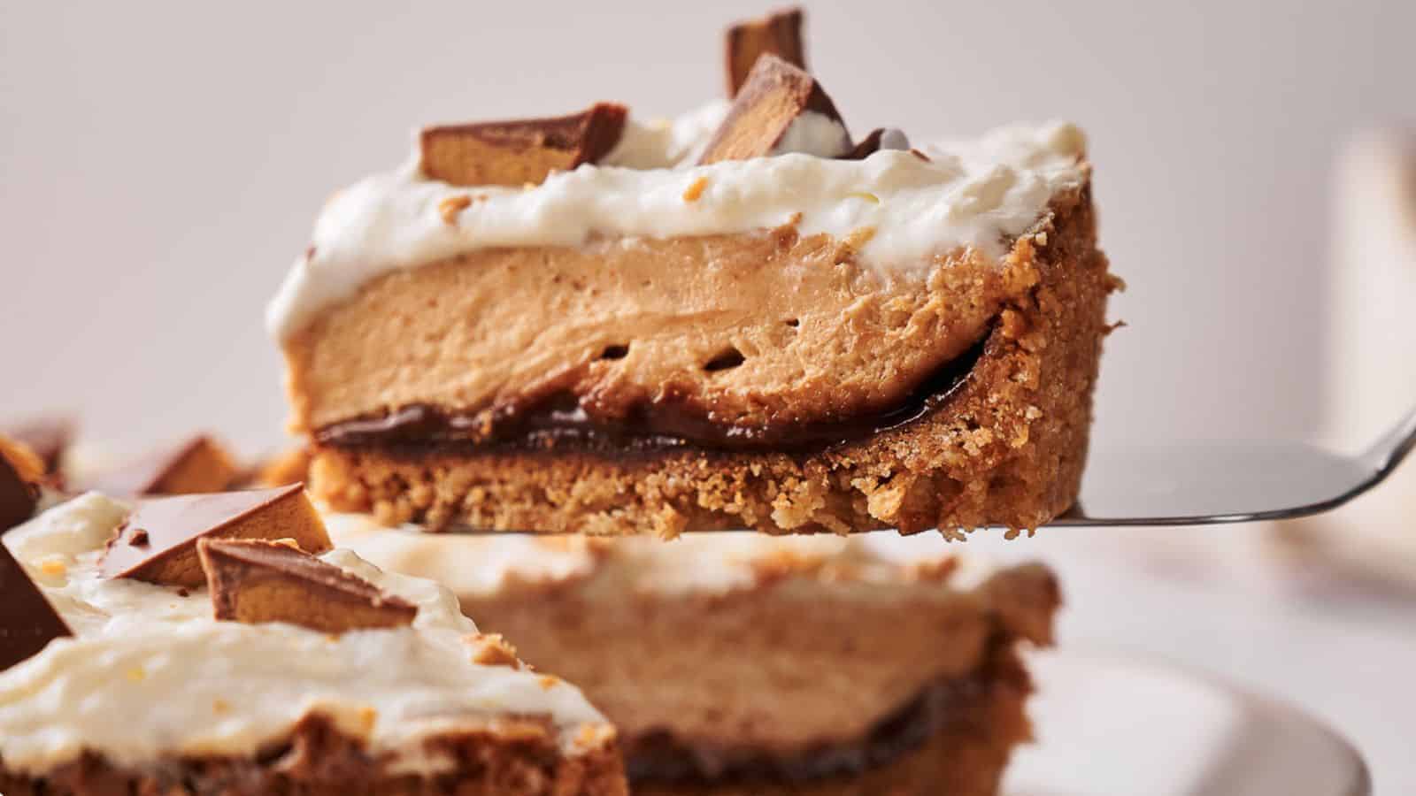 A slice of Reese's pie sits on a cake slice, ready to be served.